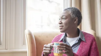 Mature Woman at Window