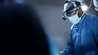hero physician performing surgery
