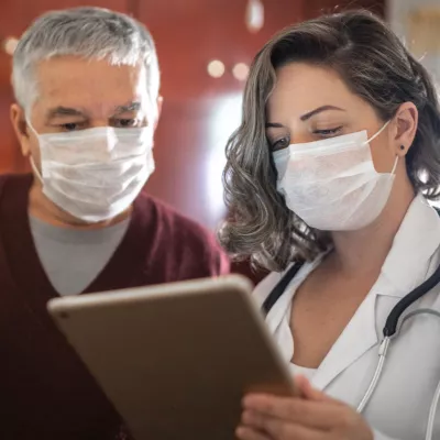 Two doctors in masks. 