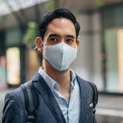 man walking with mask