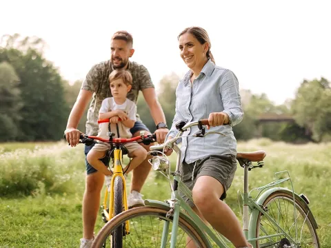Family riding bikes