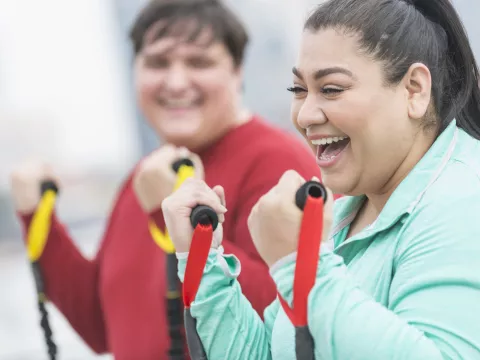 Women Exercising with Bands