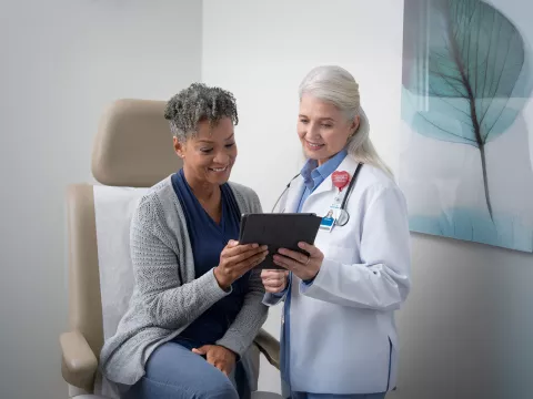 AdventHealth doctor showing results to a patient