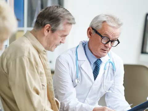 doctor talking to patient