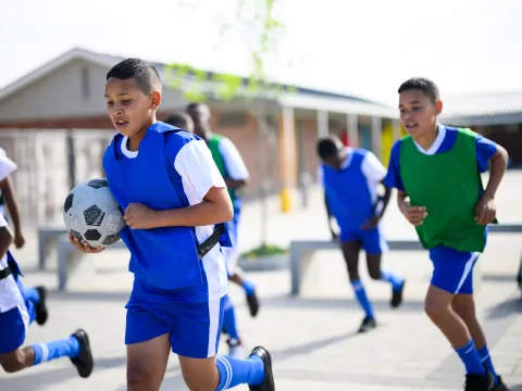 A group of students running together