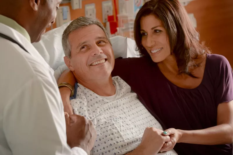 Patient with his wife in the hospital