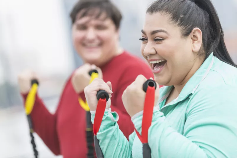 Women Exercising with Bands
