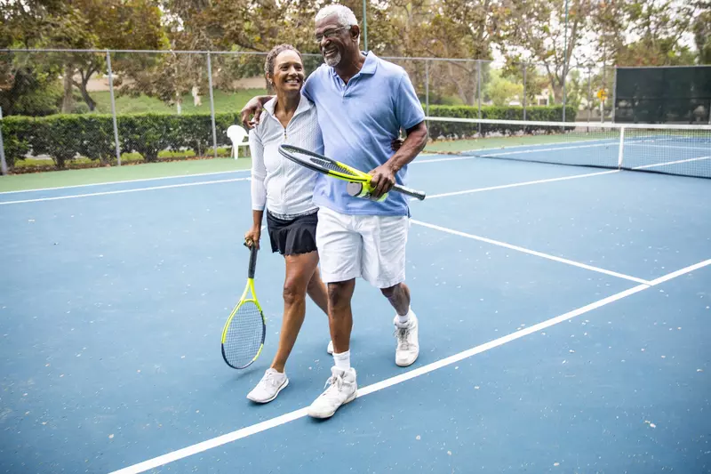 Active Older Adults Playing Tennis