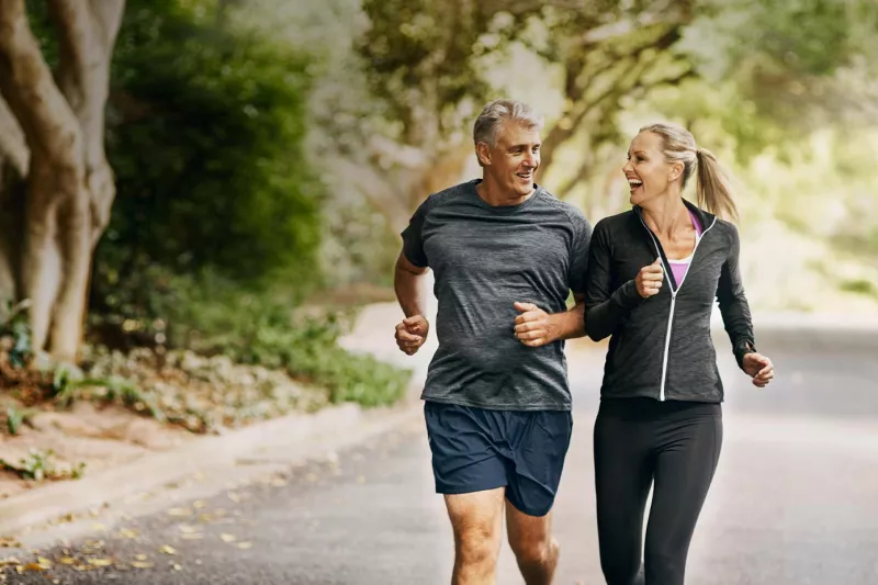 Man and woman jogging outdoors