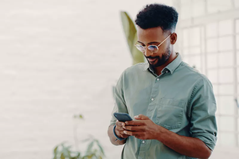 A young man on his smartphone