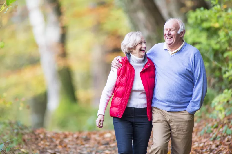 couple holding each other in the outdoors